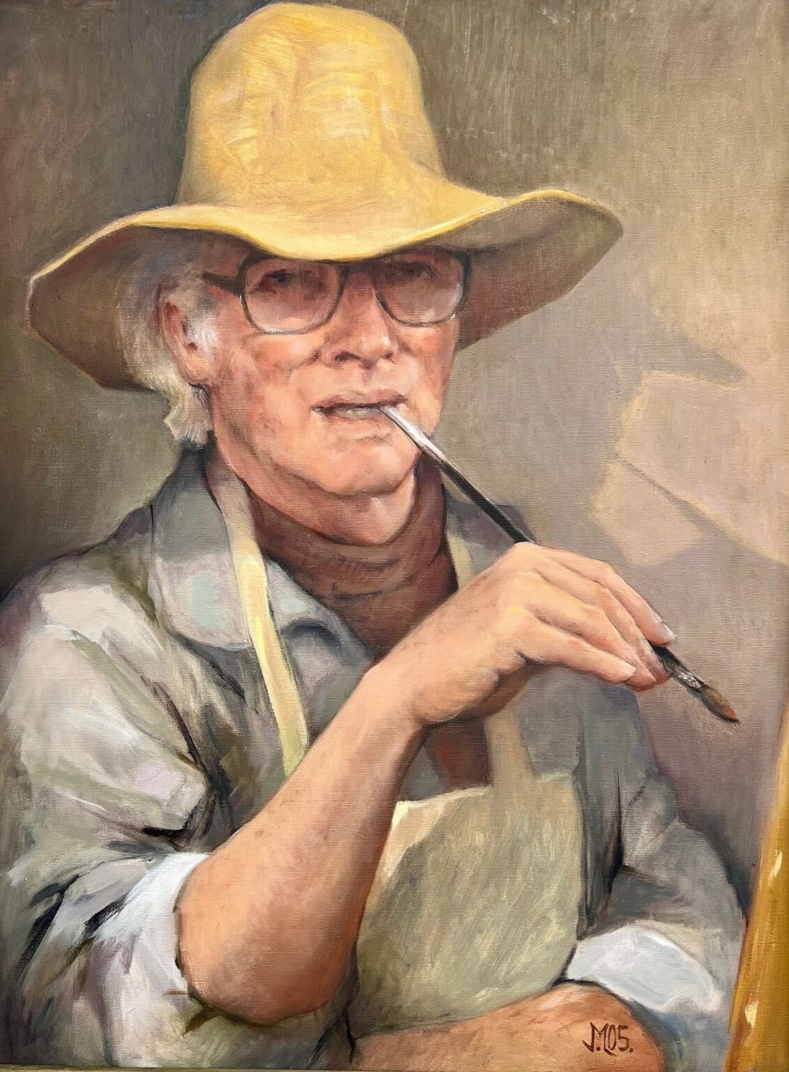 artist at easel looking out painting a self-portrait, wearing a hat